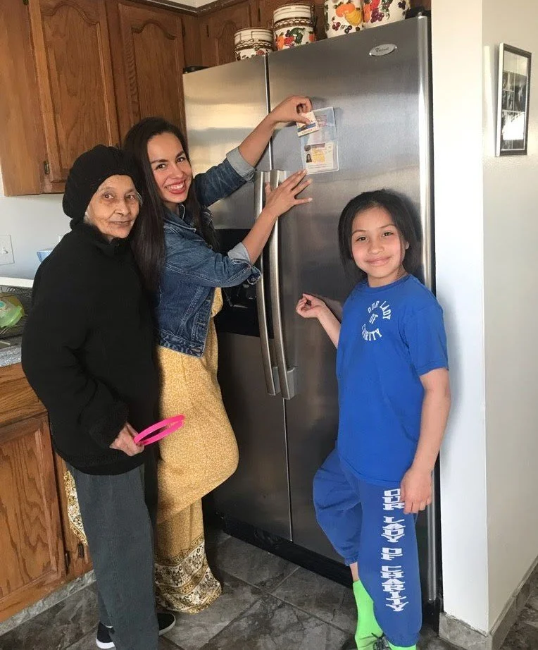 Celebrating my new VISA in my passport with my family.