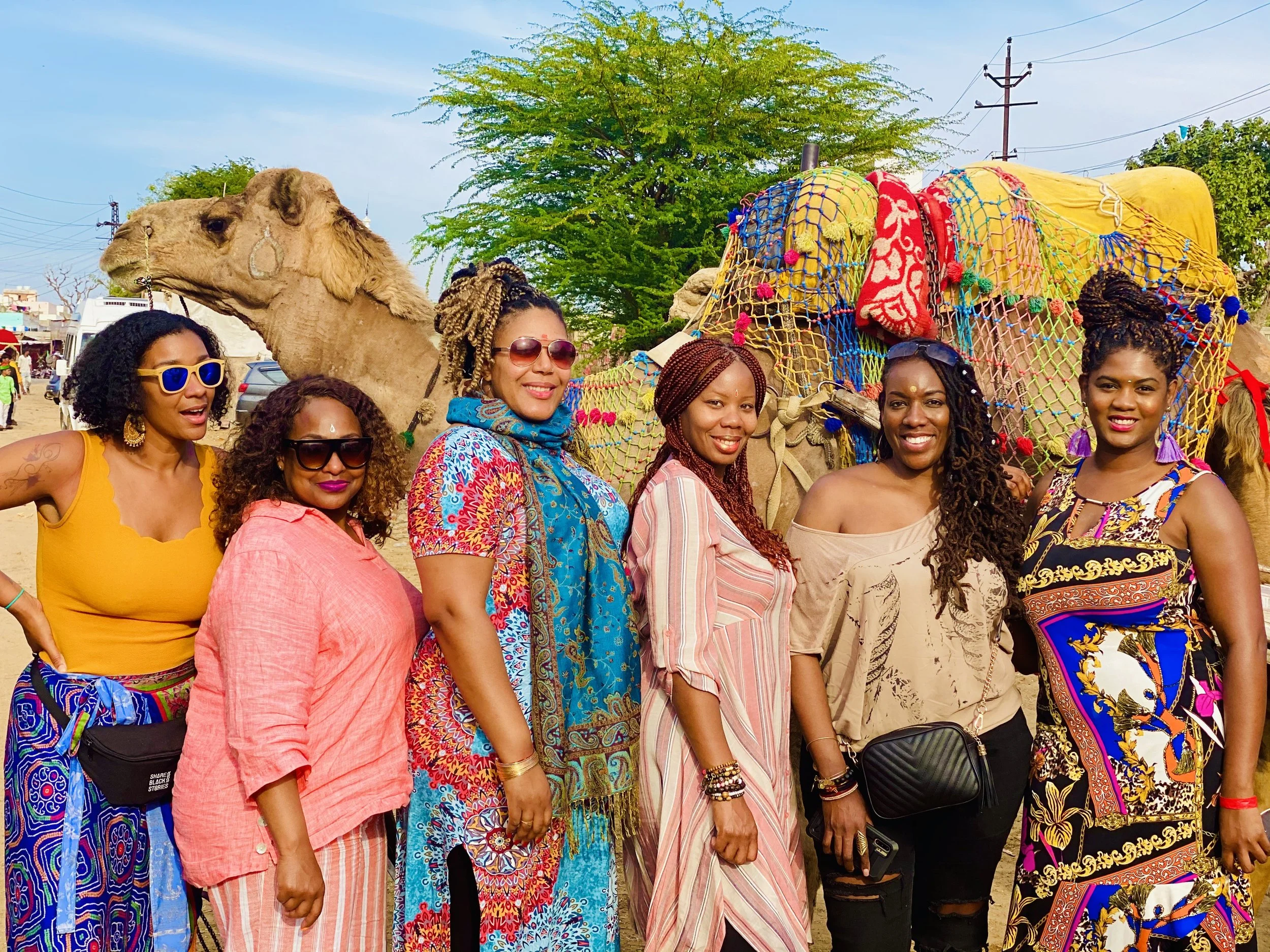 Evita Robinson with female travelers