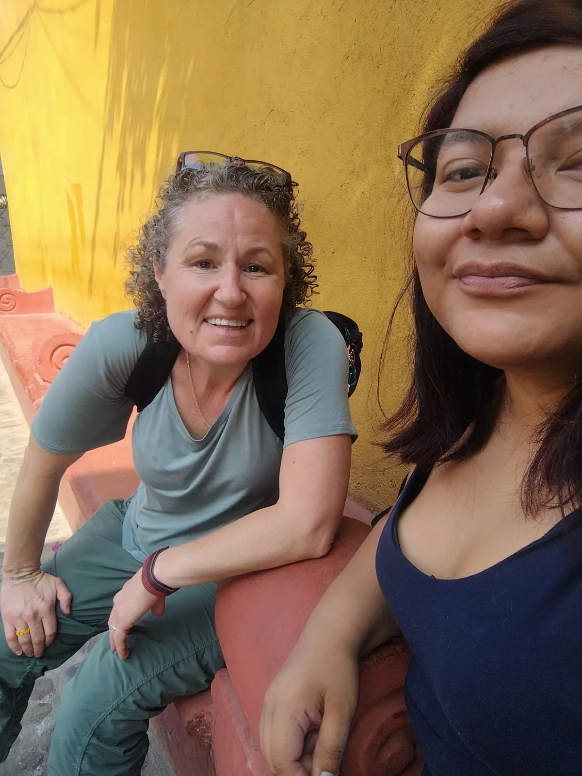 senior female traveler with local female guide in Oaxaca Mexico