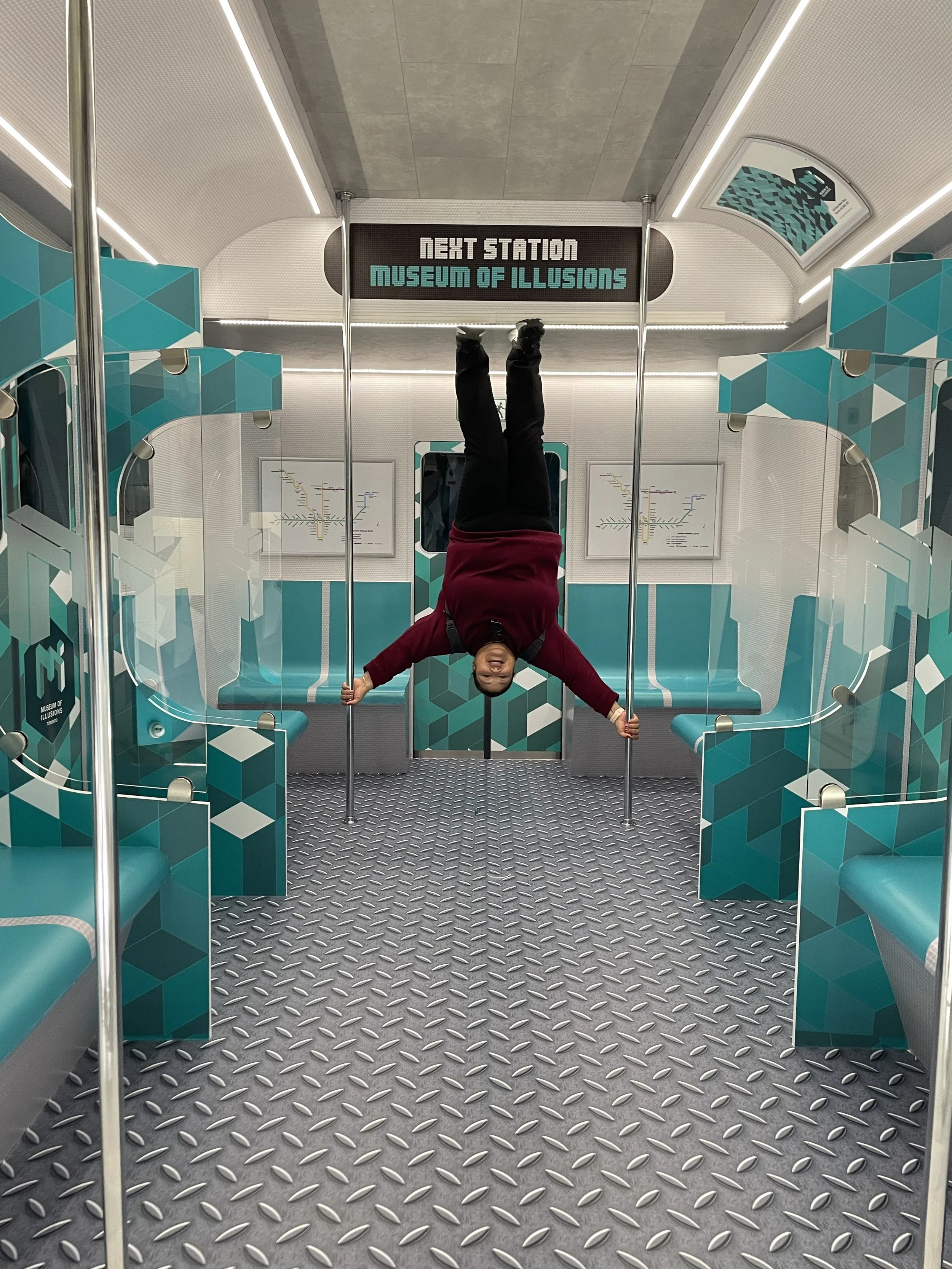 Solo female traveler on the museum of illusions Toronto Canada