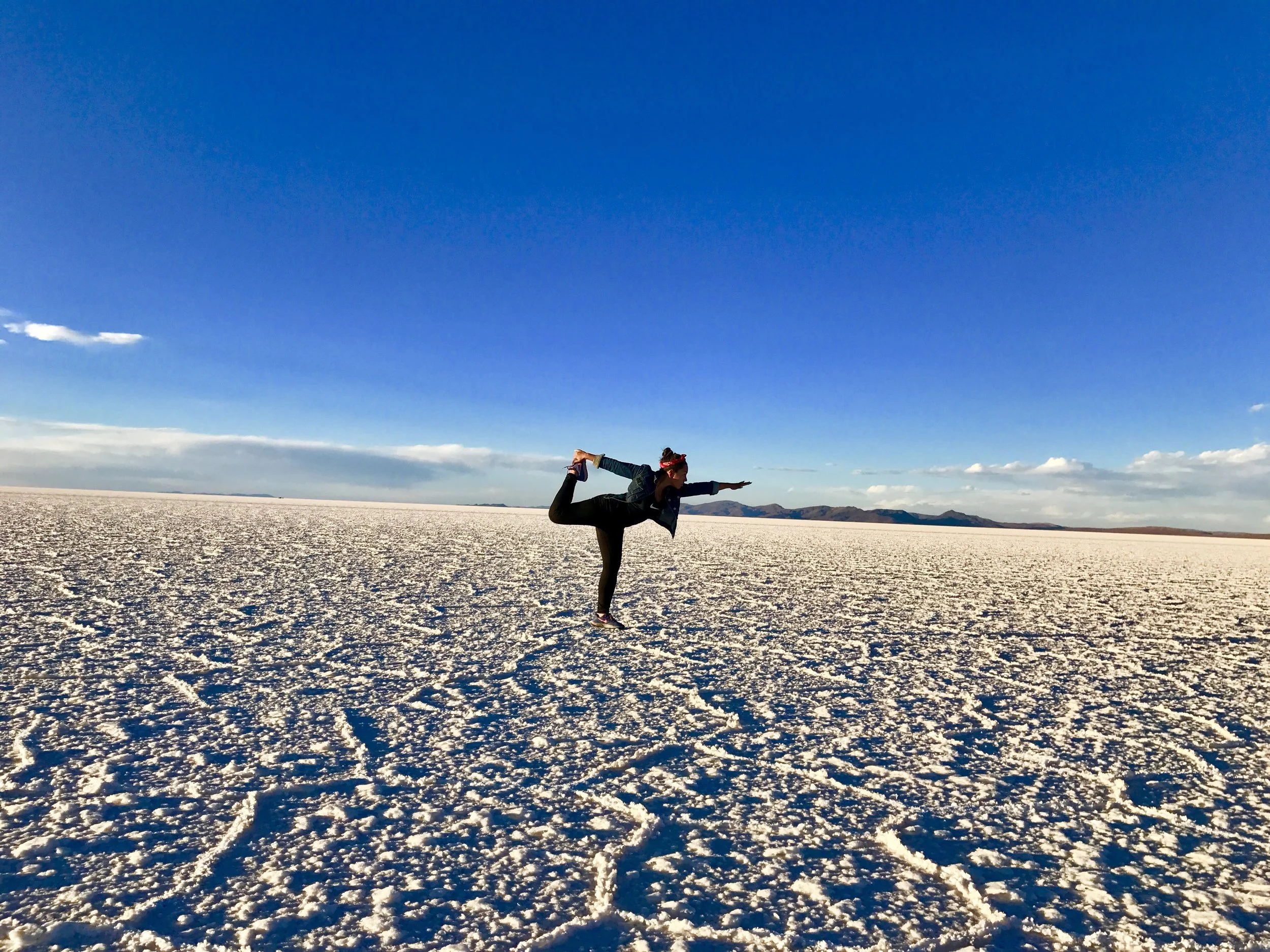 Chris Davila, Girl Takes Mundo in Salar de Uyuni in Bolivia